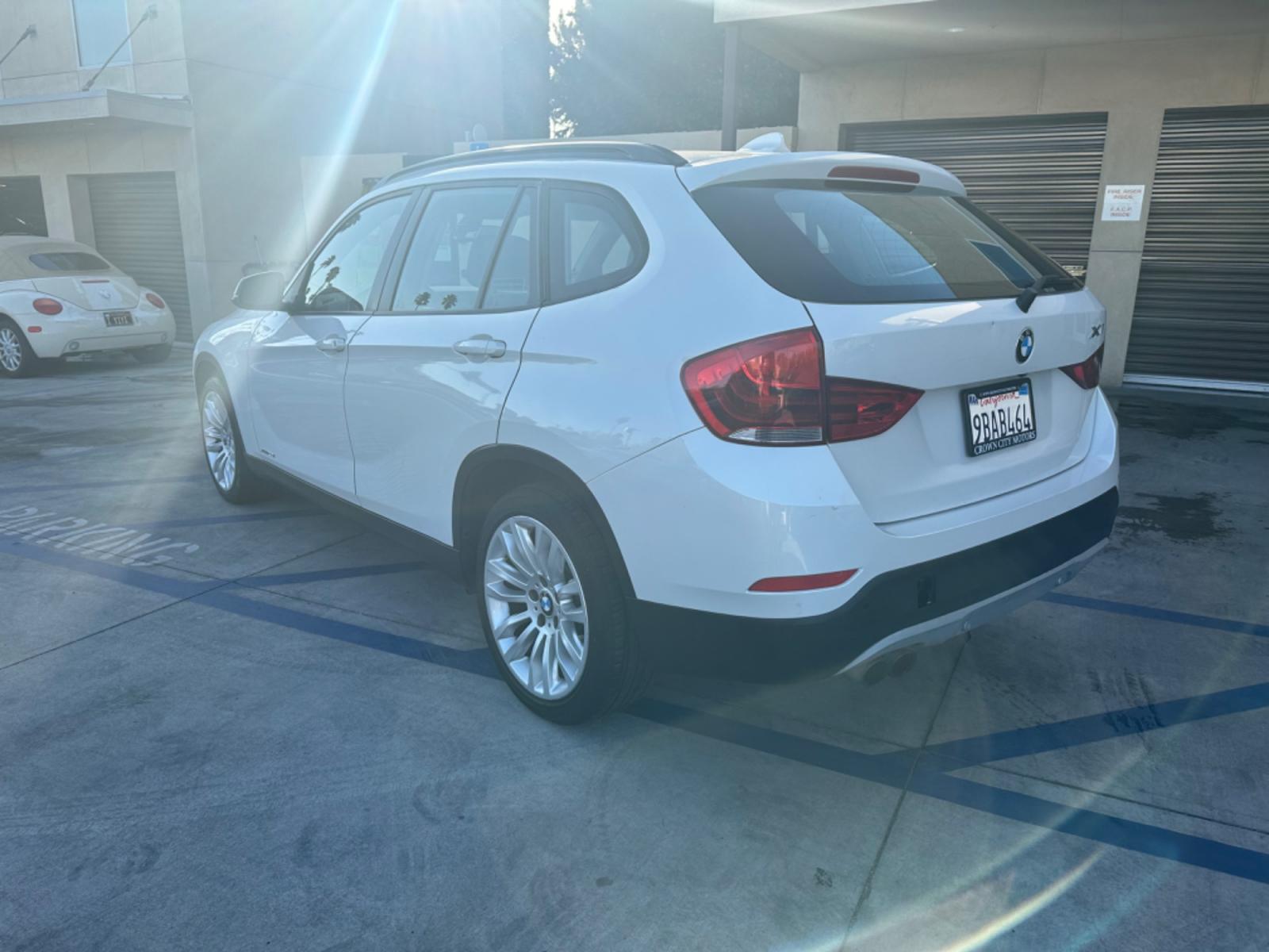2014 WHITE /Black BMW X1 Leather (WBAVL1C56EV) with an 4 Cylinders engine, AUTOMATIC transmission, located at 30 S. Berkeley Avenue, Pasadena, CA, 91107, (626) 248-7567, 34.145447, -118.109398 - Don't let bad credit or financial setbacks hold you back from owning a luxury SUV like the 2014 BMW X1 xDrive28i. At our BHPH dealership, we're here to make the car-buying process as smooth and stress-free as possible. We invite you to visit our dealership in Pasadena, CA, to explore our inventory o - Photo #2